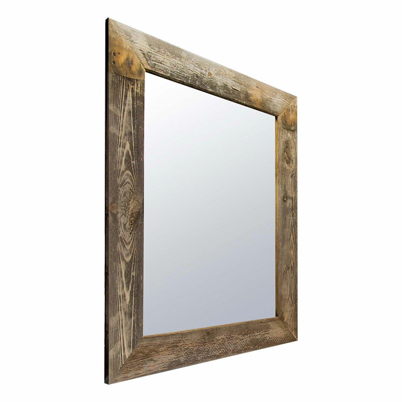 Side view of a frameless rectangular mirror showcasing a thick, weathered wood frame with visible wood grain and decorative rusted nail heads in the corners. The mirror's reflection is subtle against the white backdrop, emphasizing the frame's rustic charm.