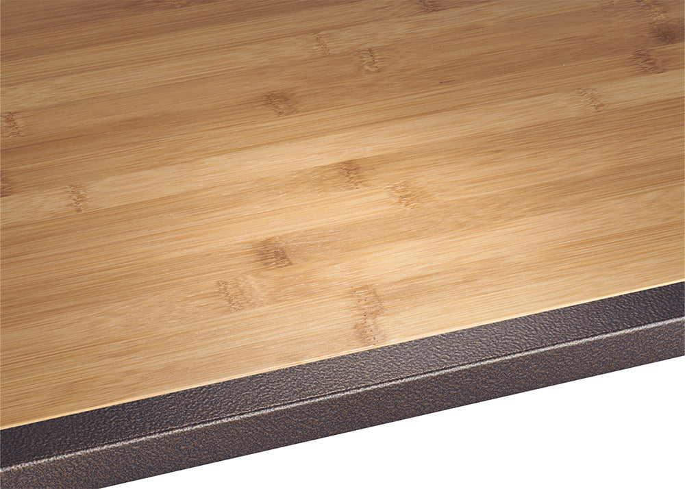 A close-up shows the corner of a light brown bamboo shelf with visible grain, bordered by a textured, dark metallic bronze frame.