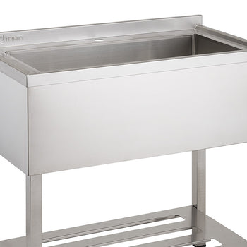A close-up studio shot of a stainless steel utility sink with a rectangular basin, set on a stainless steel frame with two horizontal bars at the bottom. The sink has a raised backsplash and the brand name 