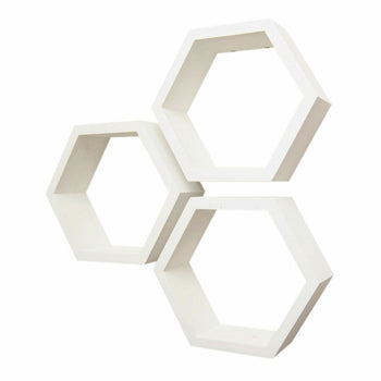 Three white, hexagon-shaped shelves are mounted on a white wall, creating a modern and geometric design. The shelves are empty, showcasing their clean lines and potential for displaying items.