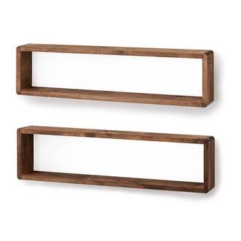 Two long, rectangular wooden box shelves are mounted on a plain white wall, one above the other. The shelves have a warm, medium-brown wood tone and rounded edges, creating a minimalist and functional design.