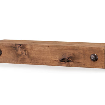 Close-up studio shot of a rustic wooden floating shelf with a light, natural finish. Two prominent black clavos flank the front edge, highlighting the shelf's farmhouse style.