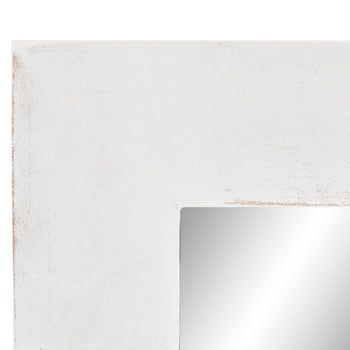 Close-up image of the corner of a farmhouse vanity mirror in white.