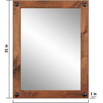 A rectangular farmhouse-style vanity mirror with a rustic wooden frame is shown against a white background. The mirror measures 24 inches wide and 31 inches tall, and the frame is 1 inch thick, featuring decorative clavos or nail heads at each corner.