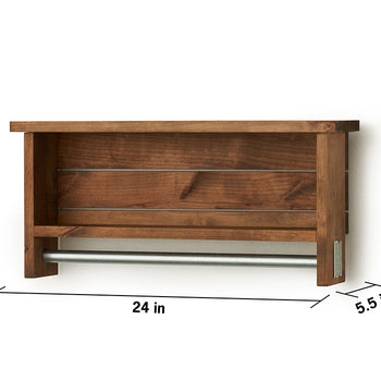 A wooden towel bar with two shelves is mounted on a white wall. The unit has a towel rod at the bottom and two slatted shelves above it, with dimensions indicating a width of 24 inches, a height of 11.25 inches, and a depth of 5.5 inches.