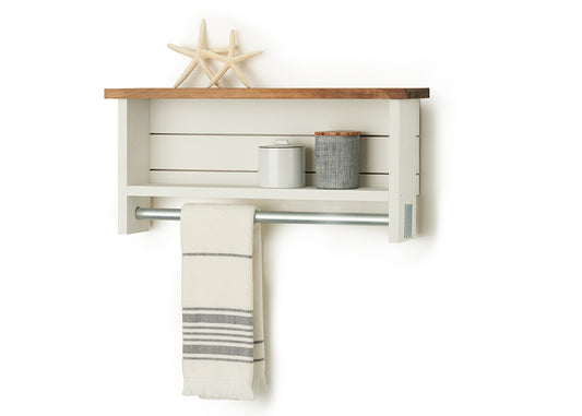 Wall-mounted shelf with a wooden top and white paneling, decorated with two starfish. The shelf holds two small containers and features a metal rod underneath with a white towel that has gray stripes.