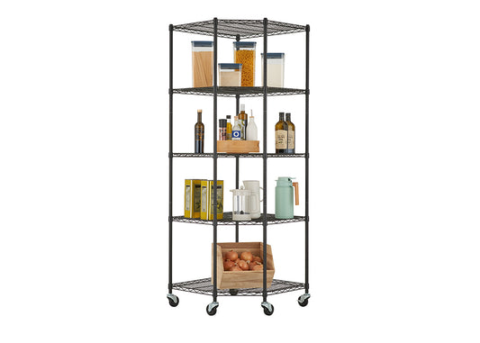 A tall, five-shelf, black wire shelving unit with wheels is pictured, holding various pantry items. The shelves are filled with clear storage containers of pasta and flour, bottles of oil and vinegar, various boxed goods, kitchen accessories, and a wooden crate of onions.