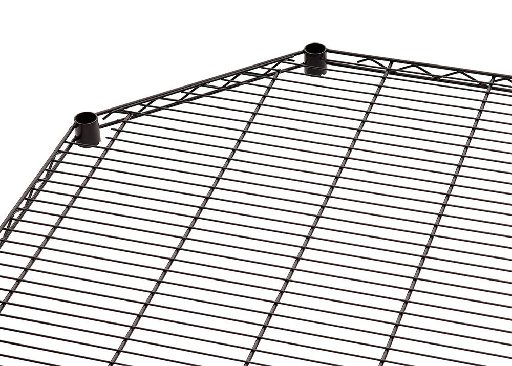 A close-up view of a black wire shelving unit's corner piece. The shelf has a pentagonal shape where two sides meet to form a corner, and it includes two cylindrical posts for vertical support.