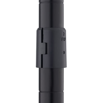 A close-up photograph shows two black metal shelving pole segments joined together by a black plastic pole connector or sleeve. The connector has an embossed arrow and the word 