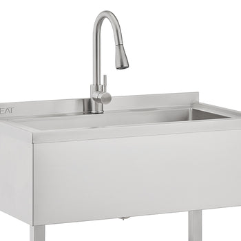 A close-up photograph features a stainless steel utility sink with a built-in gooseneck faucet that has a pull-down sprayer head. The sink has a modern, rectangular basin and is supported by visible metal legs, suggesting a laundry or garage utility setup.