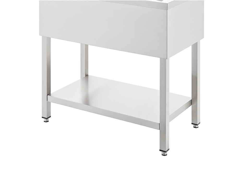 A professional stainless steel utility sink or prep table is shown on a white background. It features a rectangular basin or tabletop supported by four square legs and includes a lower stainless steel storage shelf.