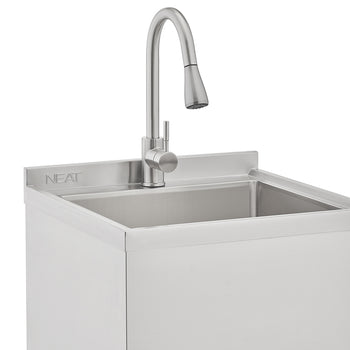 A close-up shot of a modern, stainless steel utility sink with a built-in gooseneck faucet featuring a pull-down sprayer. The 