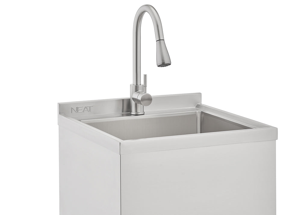 A close-up shot of a modern, stainless steel utility sink with a built-in gooseneck faucet featuring a pull-down sprayer. The "NEAT" brand name is visible on the backsplash of the basin.