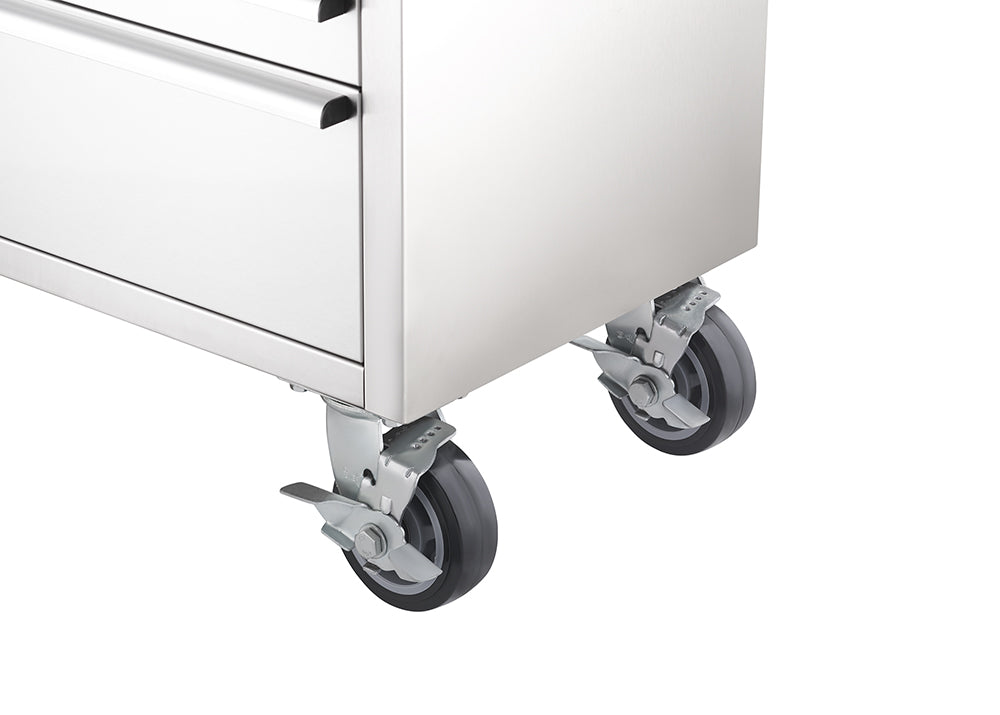 A close-up view highlights the bottom corner of a stainless steel tool workbench, showing heavy-duty swivel casters equipped with foot-operated locking levers.