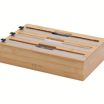 This bamboo kitchen organizer features three labeled slots for foil, wax paper, and plastic wrap, each equipped with a built-in sliding cutter. The sleek, wooden dispenser is branded with the "NEATI" logo and designed to neatly store and slice household rolls.