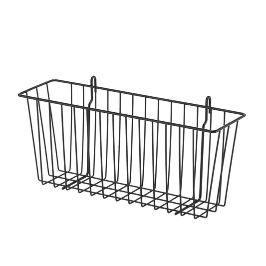 A rectangular black wire basket hangs against a white background. The basket has a grid-like bottom and vertical bars along the sides, with two hooks extending from the top back for hanging.