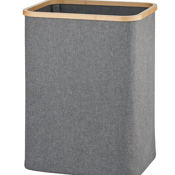 A standalone dark grey fabric laundry bin features a natural bamboo wood top rim. The open-top hamper is shown empty and centered against a plain white background.