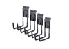 A set of four heavy-duty, black metal garage storage hooks are shown, each featuring a double-pronged U-shape and a mounting bracket with the TRINITY logo. A small sliding lock mechanism marked "OPEN/LOCK" is visible on the base of the mounting plate for each hook.