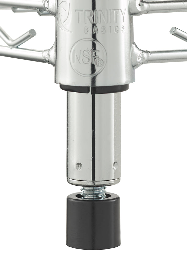 A close-up photograph displays the adjustable leveler foot on a chrome wire shelving unit, showing a black foot and threaded screw. Above the foot, the post connection features embossed text with "TRINITY BASICS" and the NSF certification mark, against a plain background.
