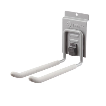 A gray metal wall-mounted storage hook with padded arms and a locking mechanism labeled 