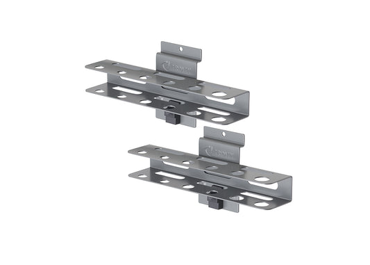 A set of two identical, brushed metal tool organizers by TRINITY are shown, designed to hold various hand tools. Each organizer features two parallel, horizontal shelves with multiple circular and oval cutouts for tool insertion, and a central mounting bracket for attachment to a wall or surface.