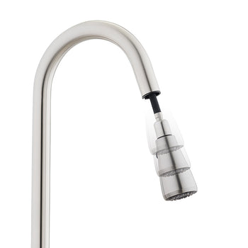 A close-up of a brushed nickel pull-down kitchen faucet shows the sprayer head extending from the curved neck. A transparent motion effect illustrates the sprayer being pulled downward, revealing the black hose inside.