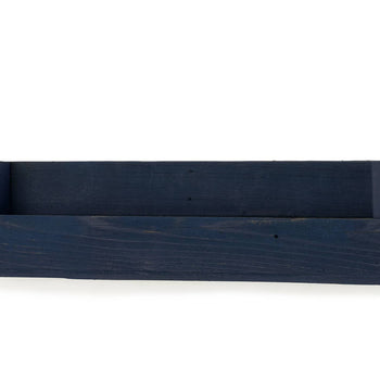 A dark blue wooden shelf is mounted on a white wall. The rustic shelf appears handmade with a slightly distressed finish.