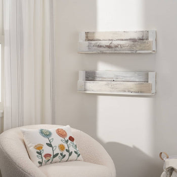 Two rustic whitewashed wooden shelves are mounted on a white wall in a room with a window and a child's animal chart. The shelves are part of a set of three 28-inch shelves, designed for children's rooms and made from reclaimed wood.