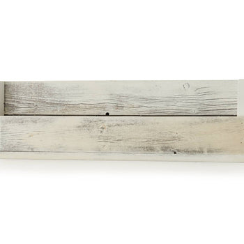 A single floating shelf made of light-colored reclaimed wood is mounted horizontally against a white background. The shelf has a rustic, weathered appearance with variations in the wood grain and subtle imperfections.
