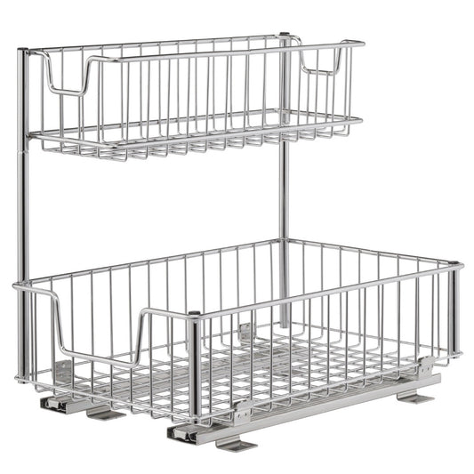 A two-tiered, chrome-plated wire organizer features two sliding baskets, with the top basket being shallower than the bottom. The unit is designed to slide out for easy access, likely intended for under-sink storage.