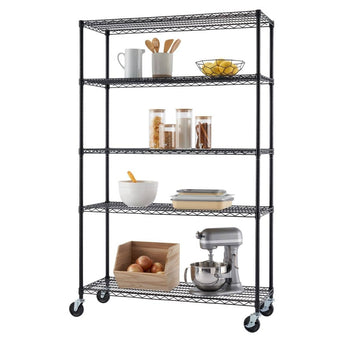 A black, five-tier wire steel garage storage unit stands upright. The shelves hold various items, including kitchen utensils, jars, a bowl, and a stand mixer.