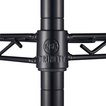 A close-up of a black, four-tier wire shelving unit, possibly a Trinity brand product. The NSF and TRINITY logos are visible on a connector piece.