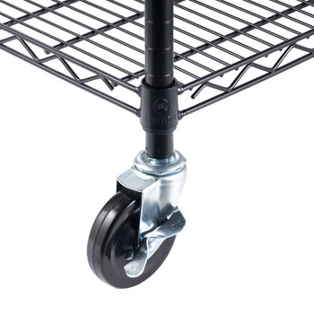 A close-up of a black, four-tier wire shelving unit, specifically highlighting the wheel. The unit appears to be the Trinity Basics 36x14x60 model, noted for its NSF certification.