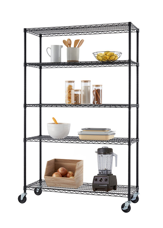 A black five-tier wire shelving unit on caster wheels is neatly organized with various kitchen and pantry essentials set against a white background. The shelves feature wooden utensils, glass storage jars, food prep containers, a countertop blender, and an open wooden crate filled with onions.