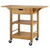 A natural bamboo kitchen cart, is shown with its two drop leaves extended. The cart features a top drawer, two lower shelves, and locking caster wheels, all made from light-colored bamboo.