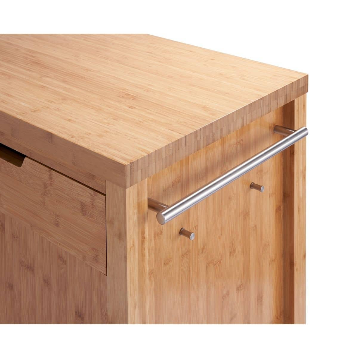 A close-up shows the corner of a light-colored bamboo kitchen island or cabinet. A stainless steel towel bar is attached to the side, along with two small pegs below it.