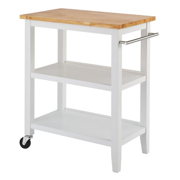 A white Trinity Wood Kitchen Cart with a light brown wooden top is angled, revealing two shelves and a silver handle on the right side. One wheel is visible on the front left leg.