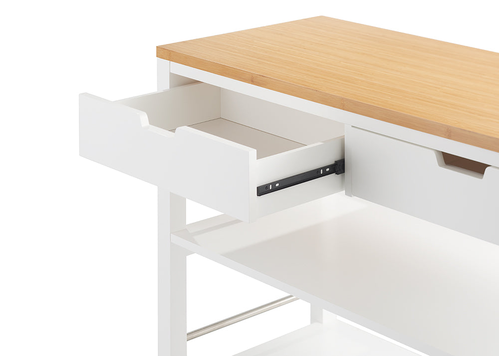 An open drawer of a white kitchen cart with a light wood top. The drawer shows the black metal glides on which it slides open.