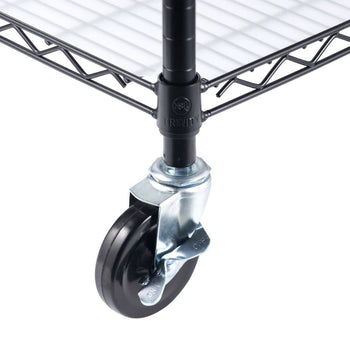 A close-up shot of a black caster wheel attached to the leg of a black wire shelving unit. The caster features a silver metal bracket and a black wheel, with the shelving unit's leg visible above it.