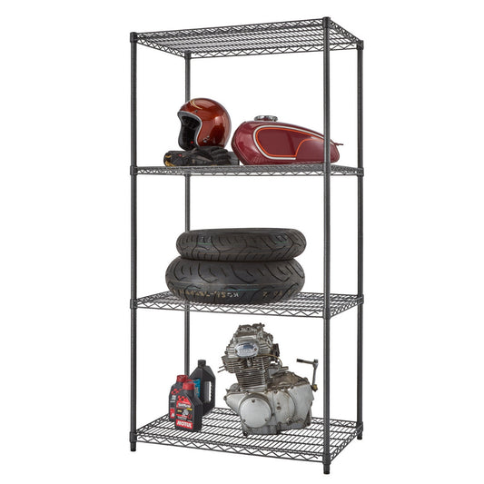 A black wire shelving unit with four tiers stands against a white background. The shelves hold various automotive or motorcycle parts, including a helmet, fuel tank, tires, an engine block, and bottles of lubricant.