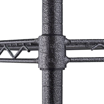 A close-up of a Trinity PRO 5-Tier Wire Shelving unit, focusing on the textured, dark-colored metal and the connecting joint of the wire shelving. The sturdy construction is highlighted by the visible support structure.