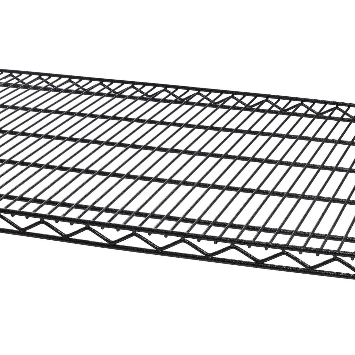 A close-up of a 48 inch by 18 inch black wire shelving of a multi-tiered storage unit. The grid pattern of the metal wires creates a textured surface.