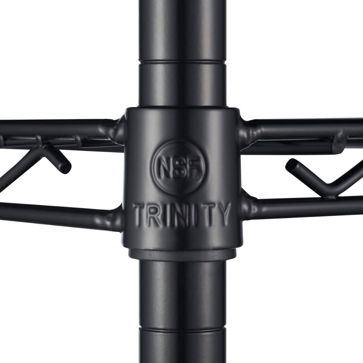 A close-up shot shows the black metal connector piece of a wire shelving unit. The connector has the "NSF" logo enclosed in a circle and the word "TRINITY" embossed on it.