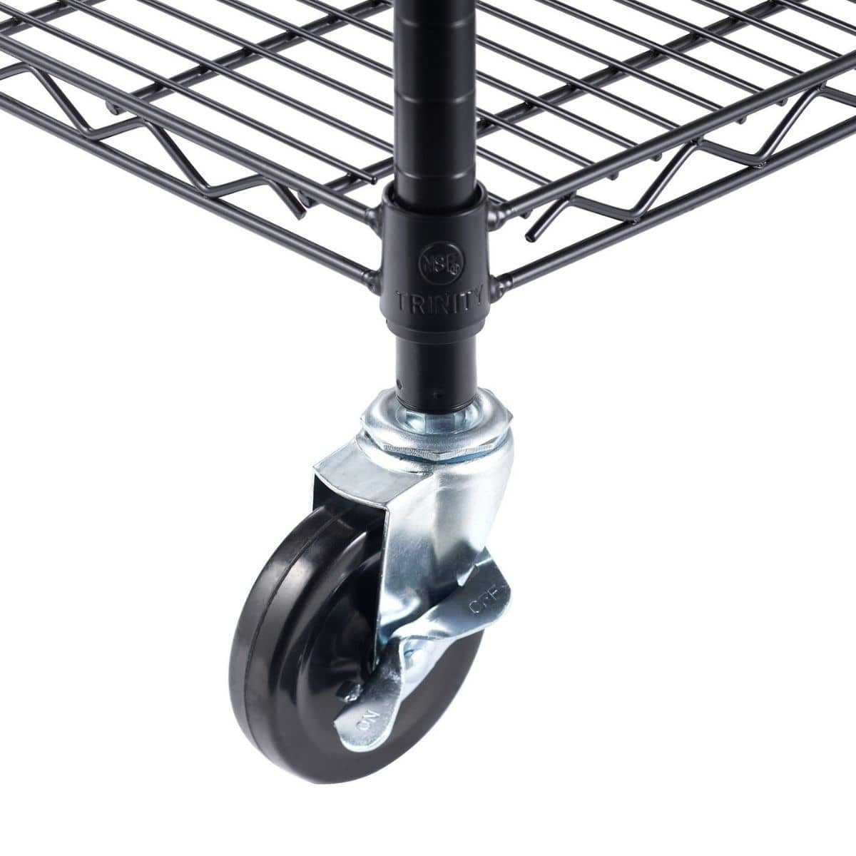 A close-up shot shows the bottom of a black wire shelving unit. A black wheel with a silver bracket is attached to one of the vertical poles of the shelf, and the "TRINITY" brand name is visible on a black connector above the wheel.
