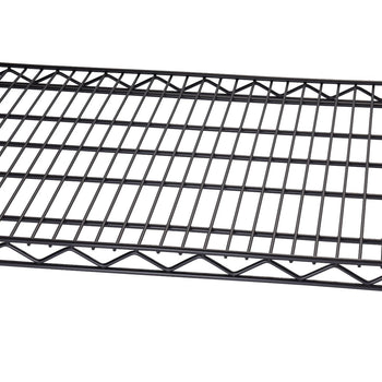 A close-up shows a section of a black wire shelving unit, likely part of a larger storage system. The grid pattern of the shelf is visible, constructed from horizontal and vertical wires supported by a wavy underframe.