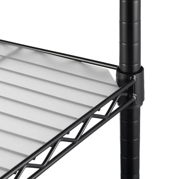 A close-up shows a section of a black wire shelving unit. A white shelf liner rests on the wire shelf, and a black pole and connecting hardware are visible on the right side.