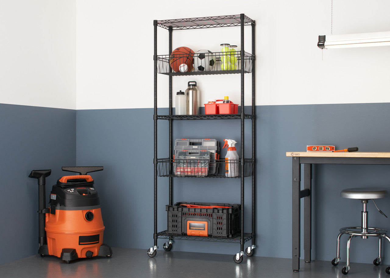A black, five-tier wire shelving rack with wheels is filled with various items, including a basketball, tools, and storage bins. The rack is positioned in a garage with a two-tone blue and white wall, a workbench, and a wet/dry vacuum cleaner.