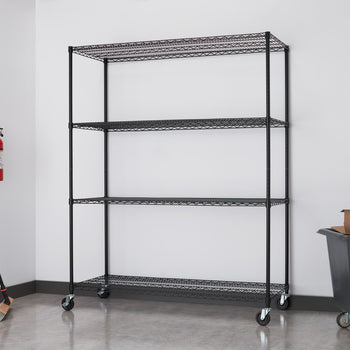 A black wire shelving unit with four tiers and wheels stands against a white wall in a room with a gray floor. A red fire extinguisher and a broom are visible to the left, and a gray bin with a cardboard box is on the right.