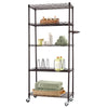 A tall, five-tier pantry rack made of dark bronze metal stands upright. The rack has wheels at the bottom and contains various items, including towels, bottles, and a wooden tray.
