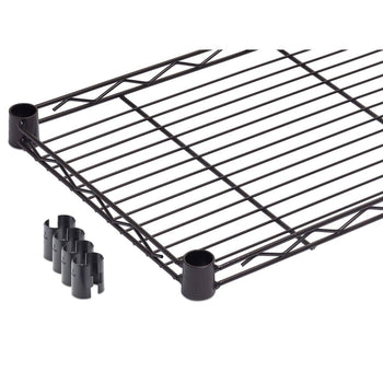 A close-up shows a section of a dark bronze, wire pantry rack with two vertical support poles and a single shelf. Four black, split, collar-like pieces that are used to secure the shelves to the poles are arranged on the white surface next to the rack.